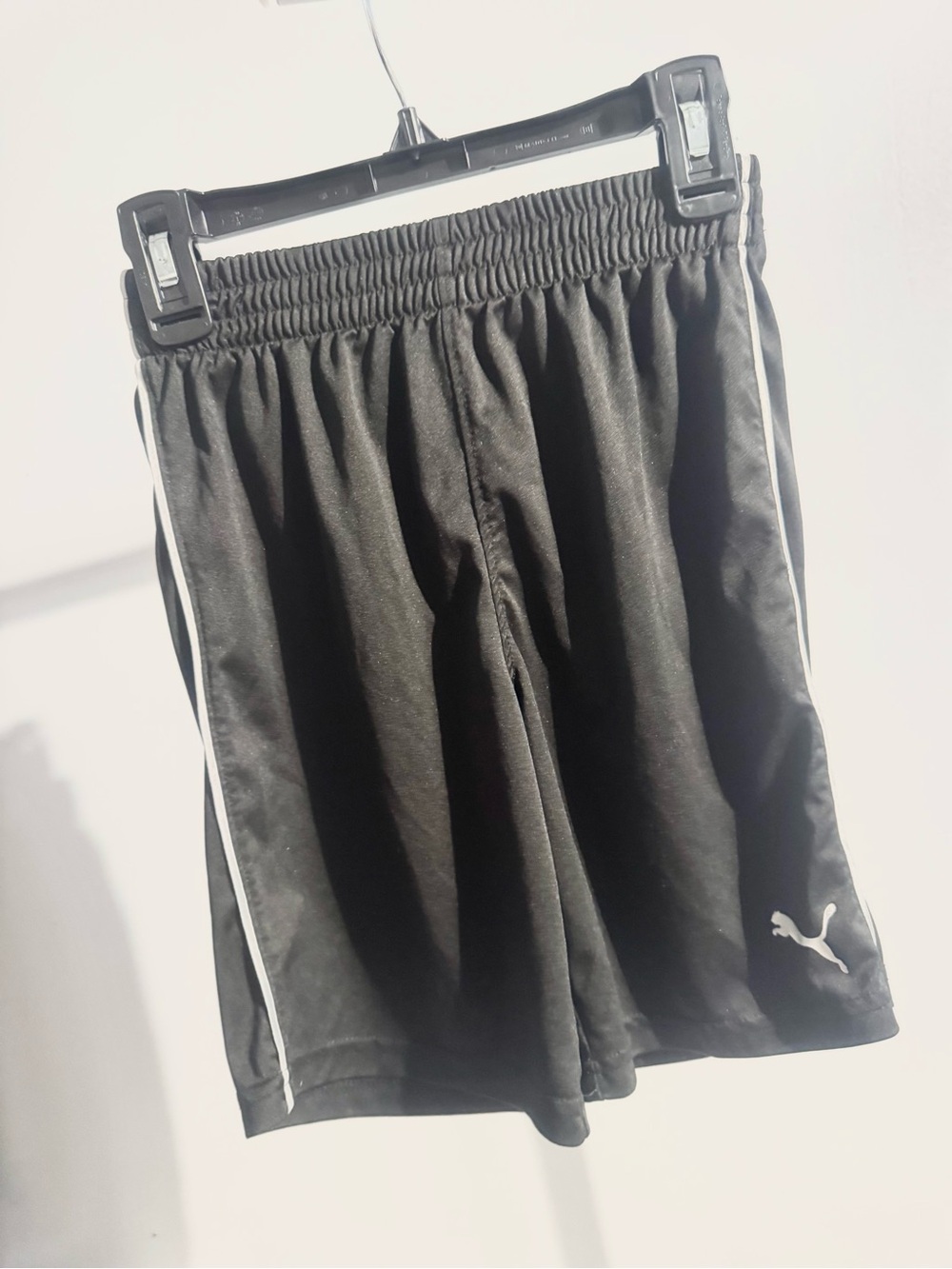 Puma Black Shorts with White Label and Green Logo
